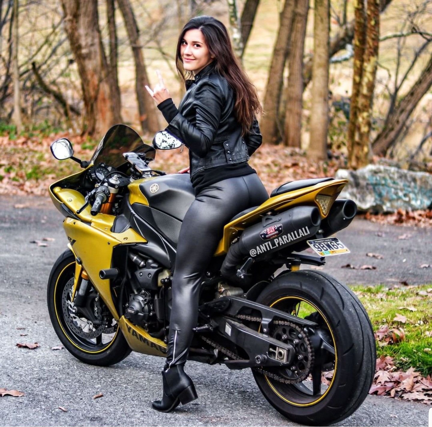 Sexy girl Brunettes on a motorcycle in Varri