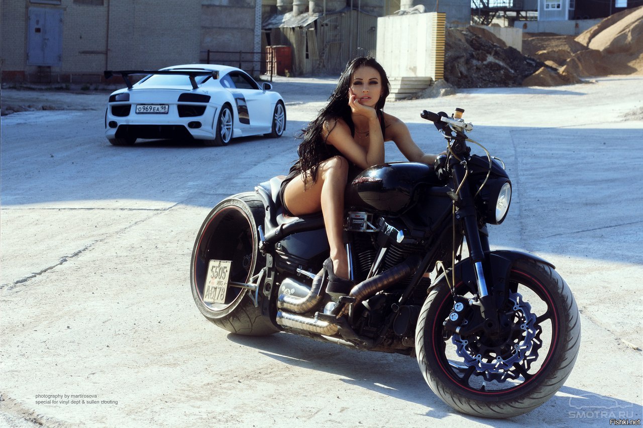 Sexy model Brunettes on a motorcycle in Varri